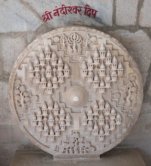 Carving of Jambudweep, the Jain depiction of the terrestrial world with holy Mount Meru at the center