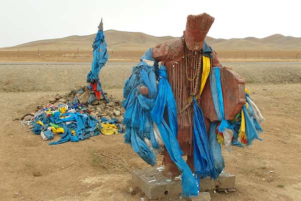 Statue of Mongolian shaman beating drum