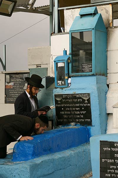 Jewish men praying at Tomb of Rabbi Isaac Luria, Old Cemetery, Safed